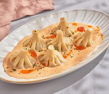 Патара хинкали в соусе том ям