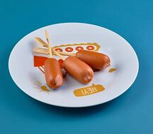 Отварные куриные сосиски