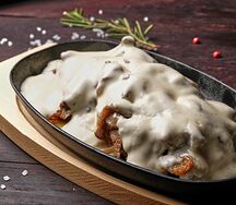 Телятина с вешенками 