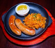 Колбаски Мюнхенские с тушеной капустой