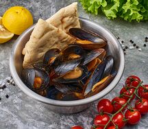 Мидии в томатном соусе