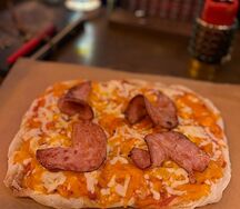 Пицца с ветчиной