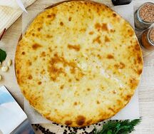 Осетинский пирог с сыром и свекольными листьями Сахараджын