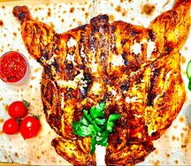 Курица на мангале целиком