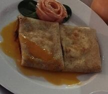 Блинчики с семгой, крем-чизом и голландским соусом