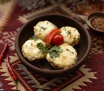 Шампиньоны запечённые в кеци