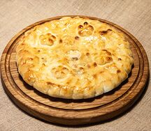Осетинский пирог с капустой и грецким орехом Кабускаджын