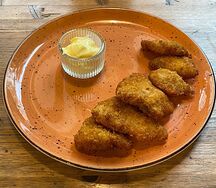 Домашние наггетсы с сырным соусом