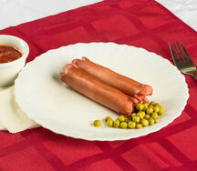 Сосиски отварные говяжьи с гарниром