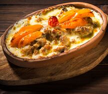 Медальоны из свинины с грибами и сыром