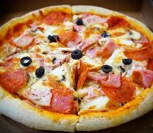 Пицца Мясной удар