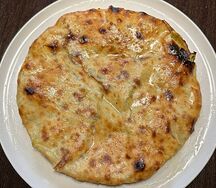 Осетинский пирог с ветчиной и яйцом
