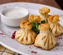 Жареные калакури с птицей и грибами