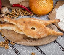 Лепешка приготовленная в тандыре