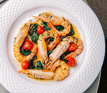 Лангустины рипассати со шпинатом и чесноком