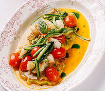 Оладья из цукини с креветками и томатами черри