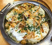 Вареники с печенью и картошкой, запеченные в сметане