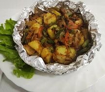 Тушёная свинина с овощами
