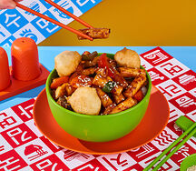 Токпокки с куриным филе и овощами в Остро-сл. соусе