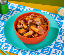 Токпокки с беконом и овощами в соусе барбекю