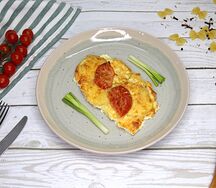 Отбивная под овощами