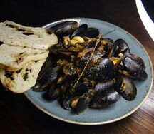 Мидии в томатном соусе