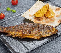 Форель речная на мангале