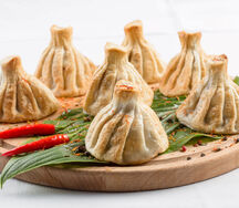 Хинкали со свининой и говядиной обжаренные