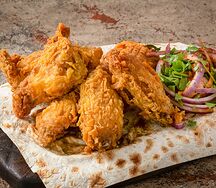 Крылья куриные острые в панировке