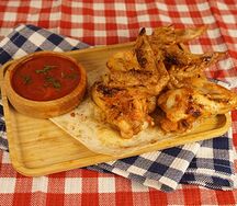 Большая порция шашлыка из куриных крыльев
