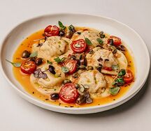 Равиоли с морепродуктами в соусе по-средиземноморски