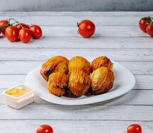 Картофель, запеченный с сырным соусом