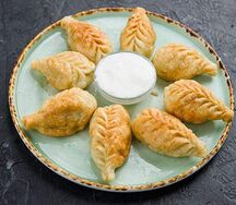 Самолепные пельмешки из говядины со сметаной жареные 
