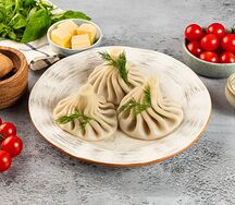Хинкали с бараниной, говядиной с пряными травами и сливочным маслом