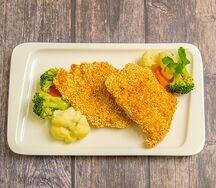 Медальоны из индейки в кунжуте с овощами