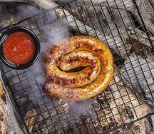 Жареная куриная колбаска с гарниром