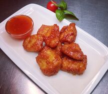 Куриные кусочки в соусе чили