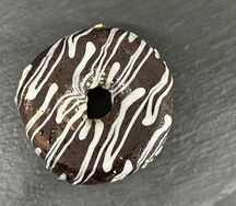 Пончик шоколадный