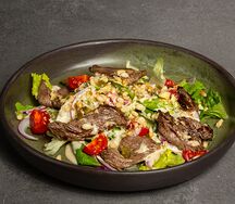 Фирменный теплый салат Дубай