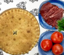 Телятина с помидорами