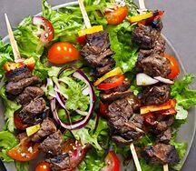 Beef kebabs & salads