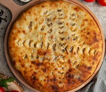 Осетинский пирог с мясом и грибами
