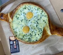 Хачапури по-аджарски с сыром и зеленью 