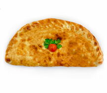 Кальцоне с ветчиной и грибами