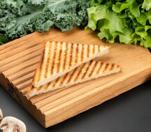 Гренка пшенично-ржаная с чесночным маслом