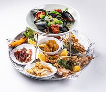 Ассорти морепродуктов на мангале