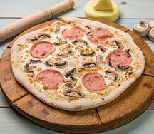 Пицца с ветчиной и грибами