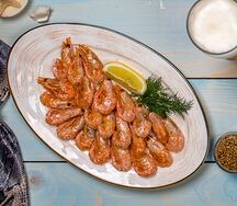 Креветки, жаренные с чесноком