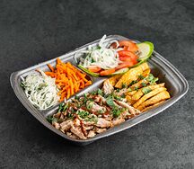 Шаурма с шашлыком из свинины на тарелке