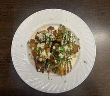 Запечённые куриные крылья в соусе